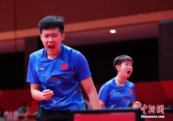 資料圖：雅加達(dá)亞運(yùn)會(huì)，王楚欽/孫穎莎奪得混雙冠軍。 <a target='_blank' href='/'>中新社</a>記者 劉關(guān)關(guān) 攝