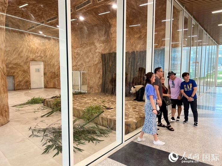 當(dāng)?shù)赜慰团c“四?！焙嫌?。人民網(wǎng)記者 張志文攝