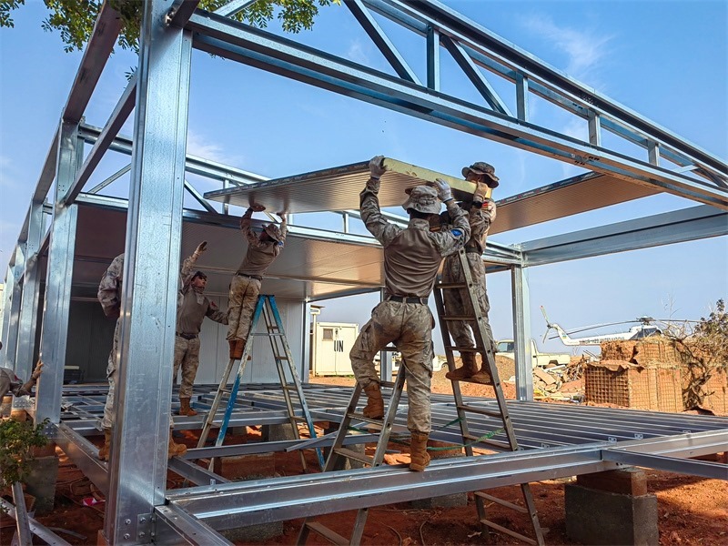 小組協(xié)同推進工程任務(wù)。鄧原淘攝